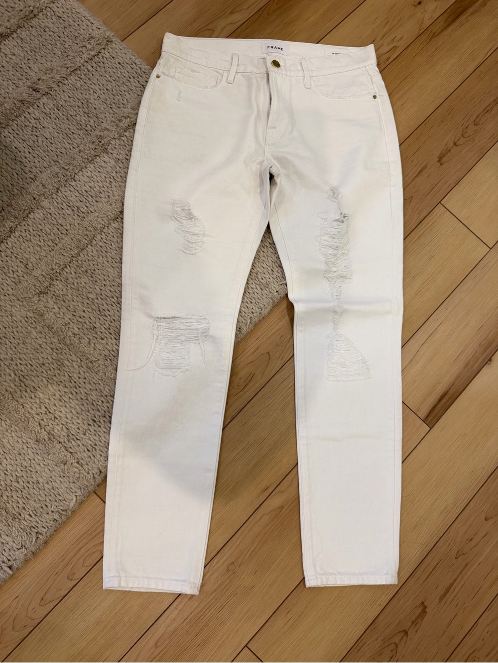Frame Denim women’s White Distressed Slim Jeans